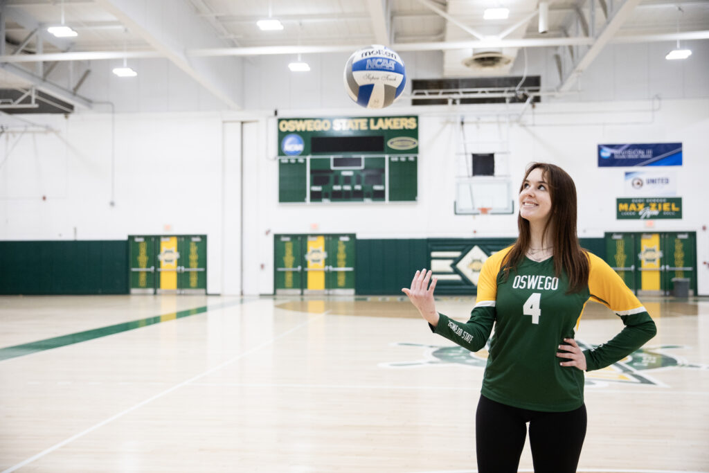 Madison Gordon twirling volleyball